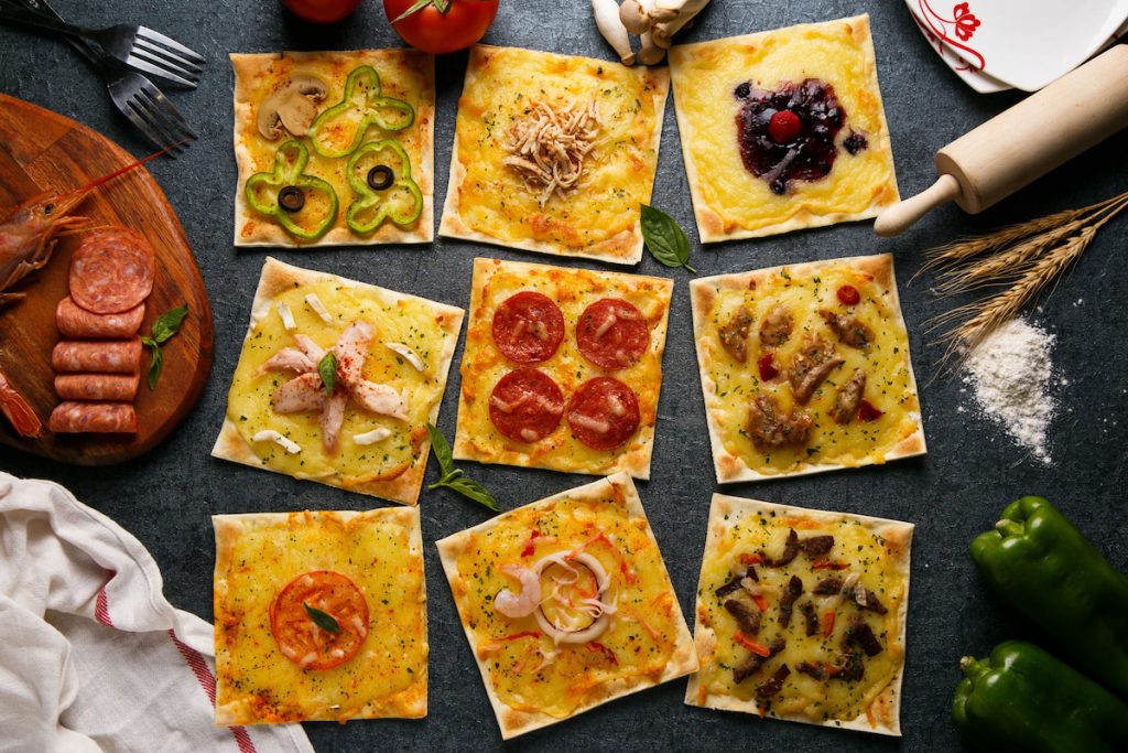 多款風味的米披薩讓消費者一嚐再嚐。(照片提供/披薩市)